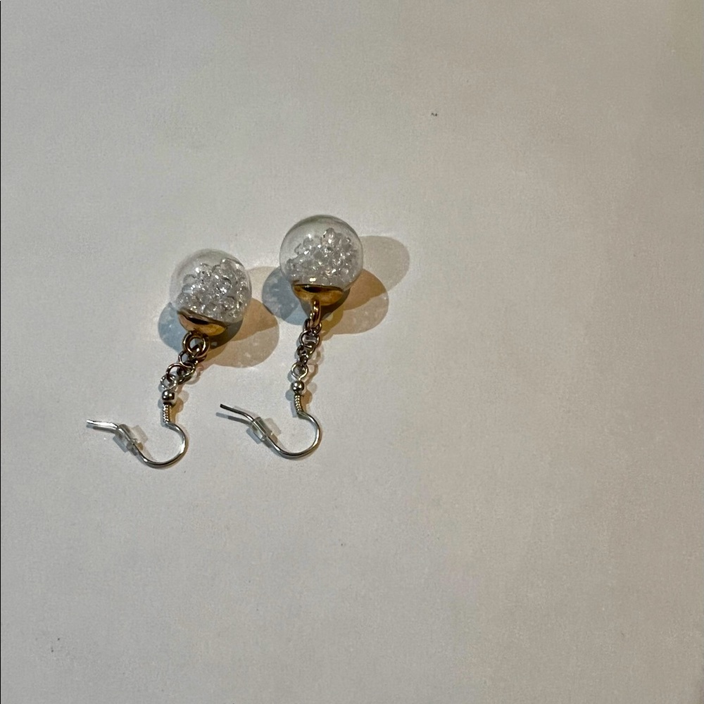 hand-made earrings by 10 years old girl.